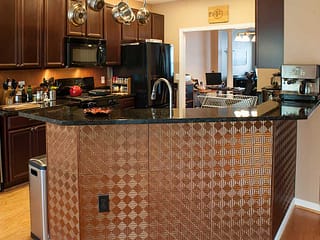 Under Counter Cabinets with Fasade Miniquattro in Antique Bronze