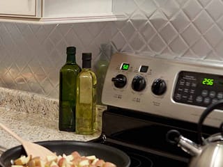 Fasade Backsplash - Quilted in Brushed Aluminum