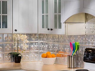 Fasade Backsplash - Fleur de lis in Brushed Aluminum