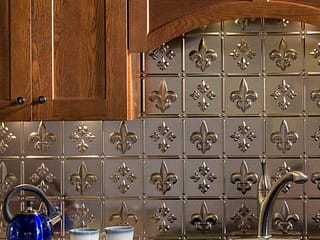 Fasade Backsplash - Fleur de lis in Brushed Nickel