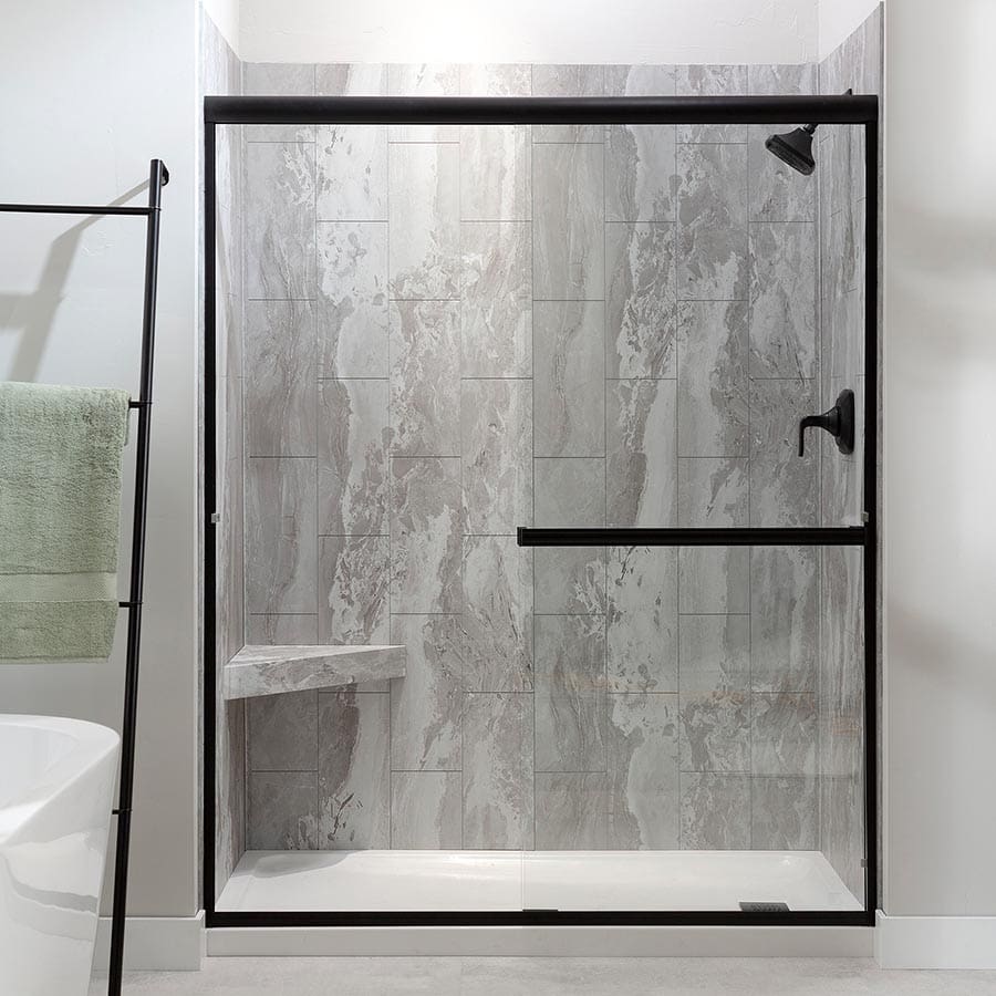 Palisade shower wall and matching bench in Smoky Sky