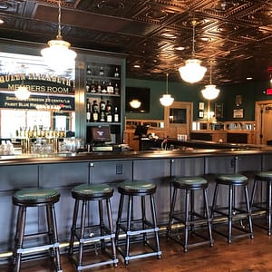 Oshkosh Country Club - Fasade Rosette Ceiling Tile in Oil-Rubbed Bronze and GridMAX ceiling grid covers