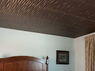 Fasade 2x2 Direct Apply Ceiling Tile - Dunes (Vertical) in Oil-Rubbed Bronze