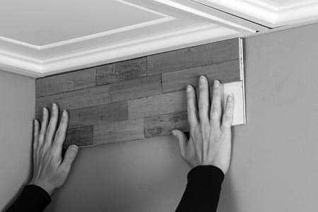 Beginning from inside corner on left, place first tile.