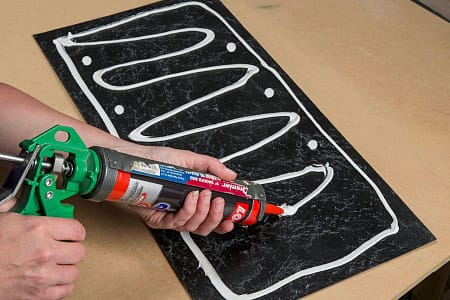  Perimeter glue 1/2" from edges around entire panel. Add glue dots in every open "u".