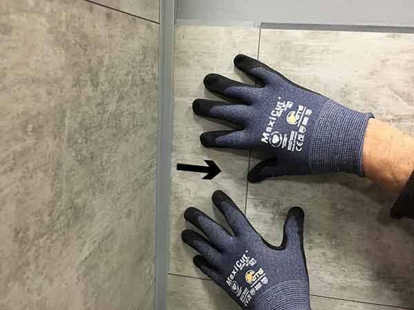 Pull tile into inter-locking joints