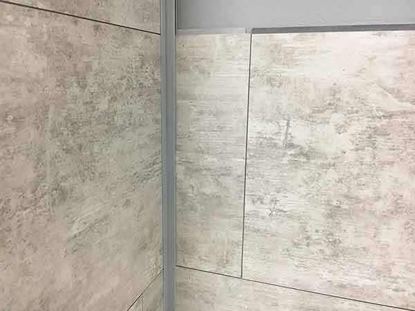 Inter-locking joints at tile's right and bottom are tight