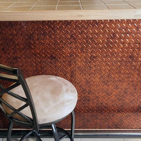 Fasade&#039;s Diamond Plate Wall Panel in Moonstone Copper