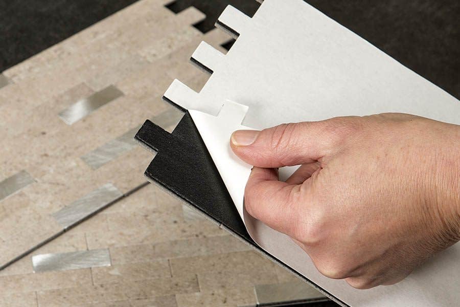 The adhesive on the back of the Aspect Collage tiles is extra sticky and pressure sensitive