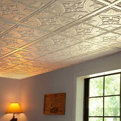 Antique ceiling tiles in white - installed in living room