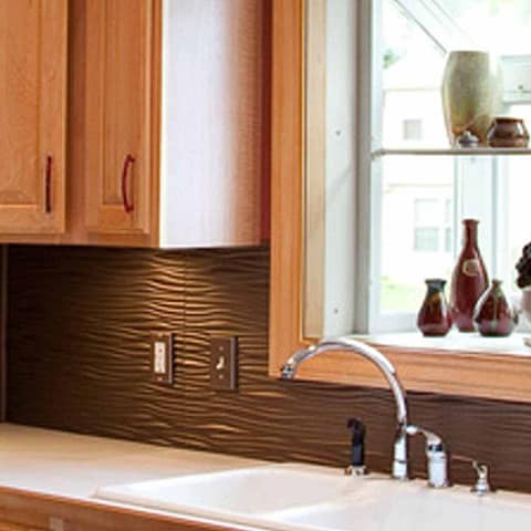 Fasade Backsplash - Waves in Argent Bronze