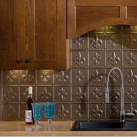Fasade Backsplash - Fleur de lis in Argent Bronze