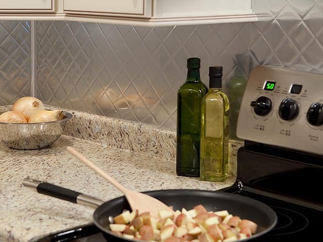 Quilted backsplash in Brushed Aluminum